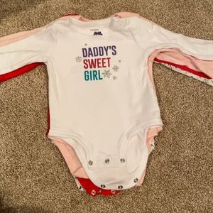 5 Carter’s long sleeved baby girl onesies size 6M